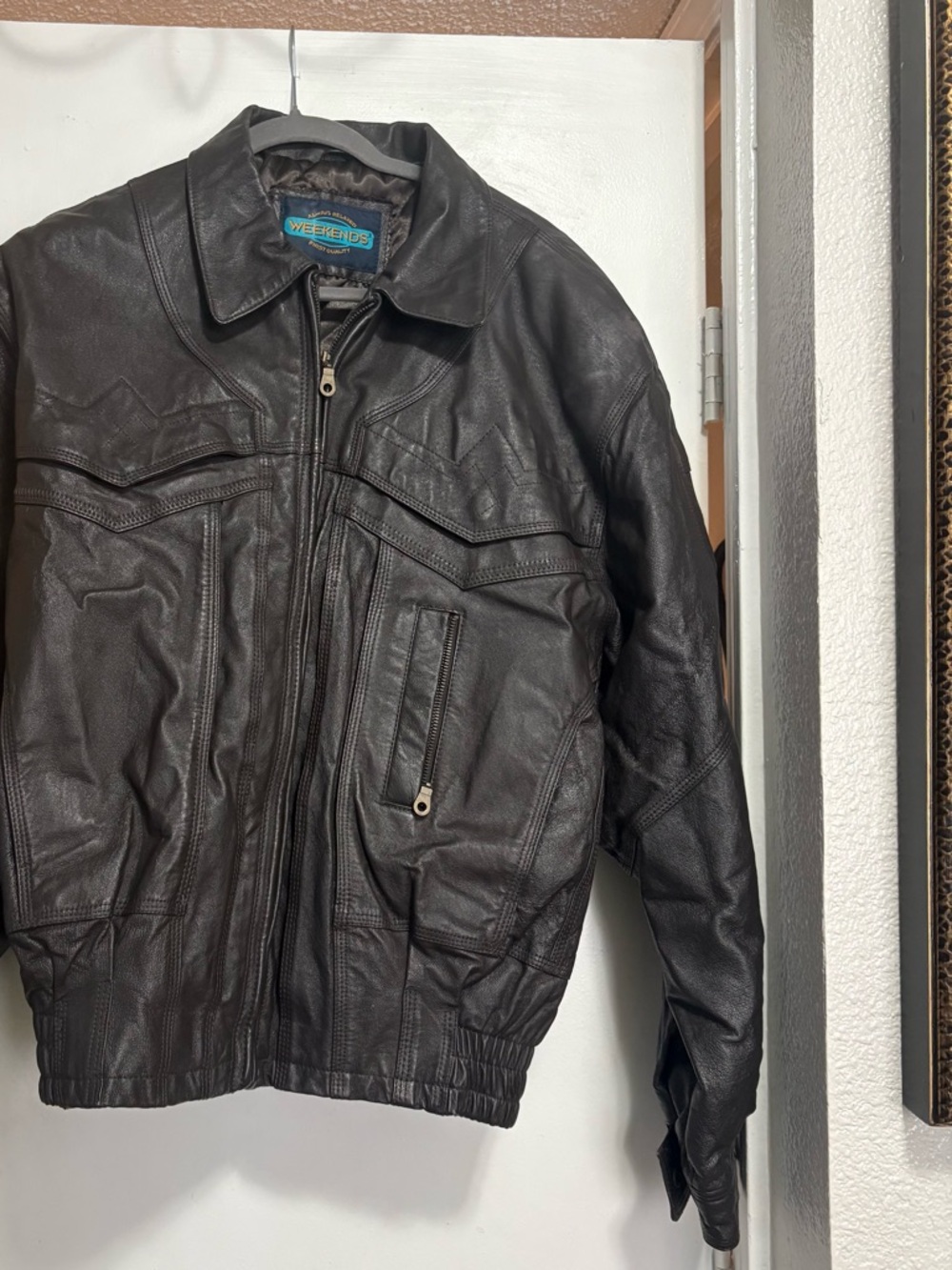 Brown brand new Weekends leather bomber coat. Lined with 2 pockets inside.